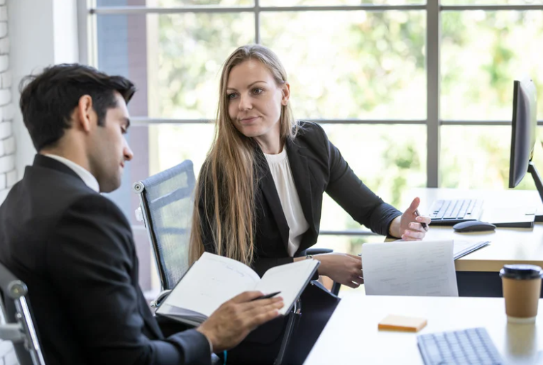 Woman talking to man about probation