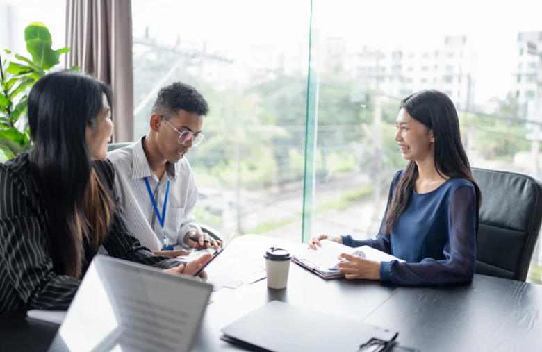 People in a HR meeting about documentation