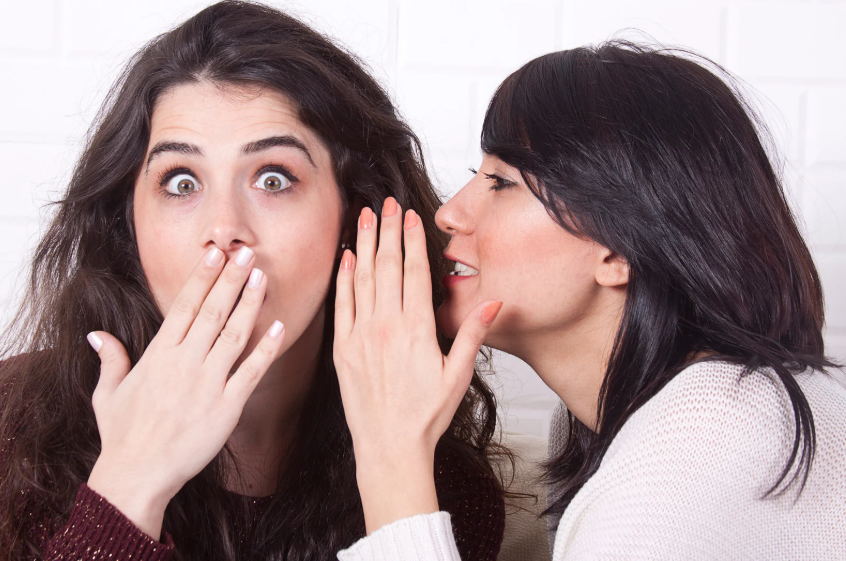 Women Gossiping at work