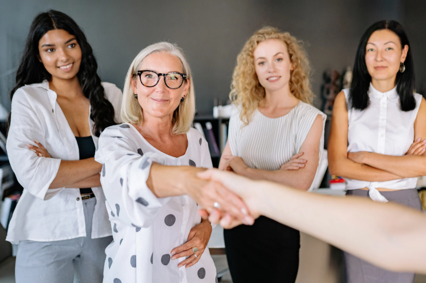 Women Shaking Hands