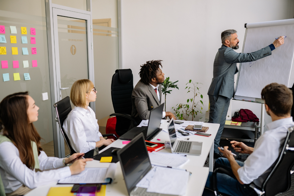 People around table in office