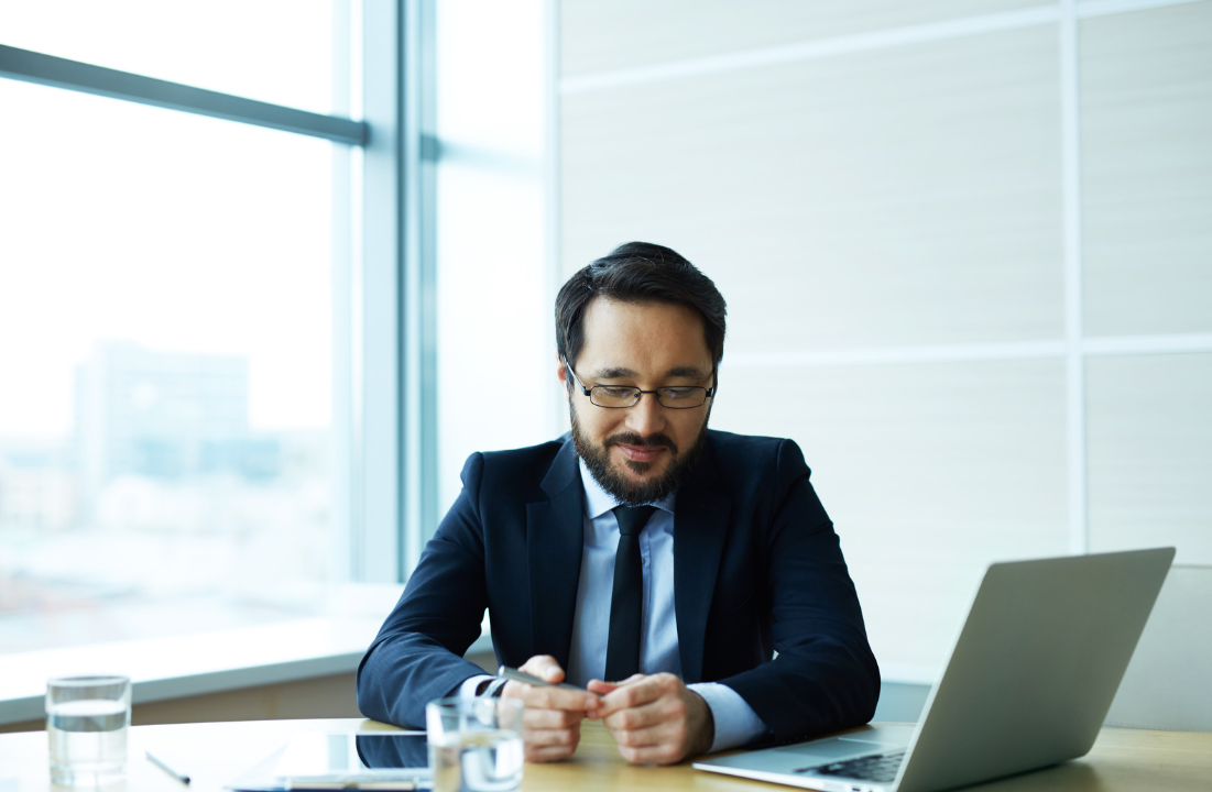 Employer sitting at his desk