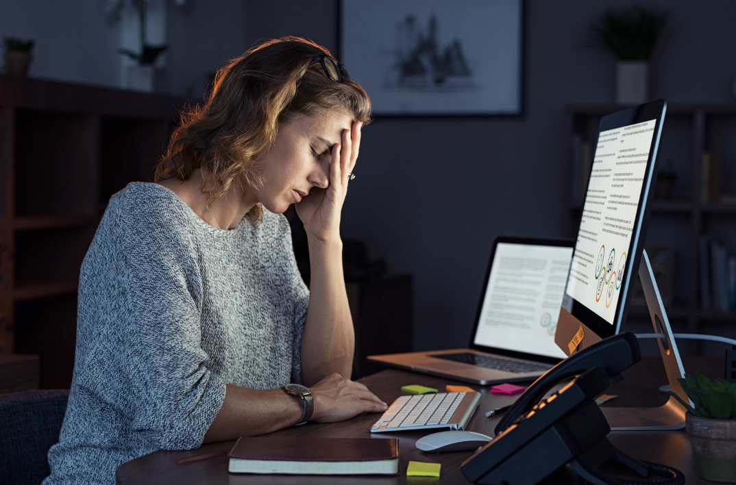 Woman stressed out at work