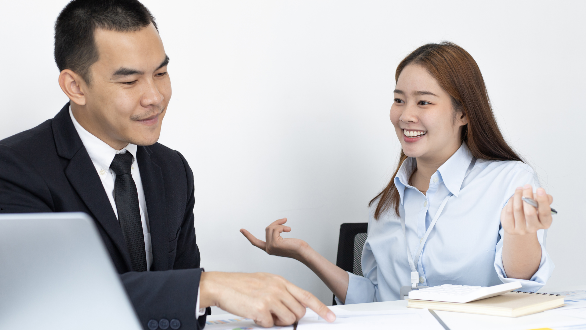 man is talking to woman