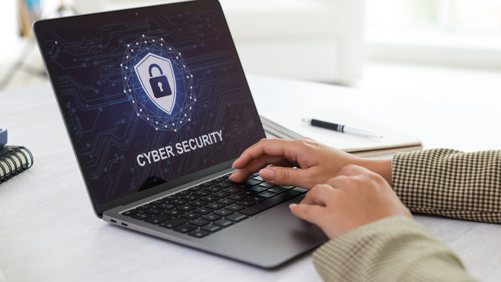 laptop with the words cyber security written on it