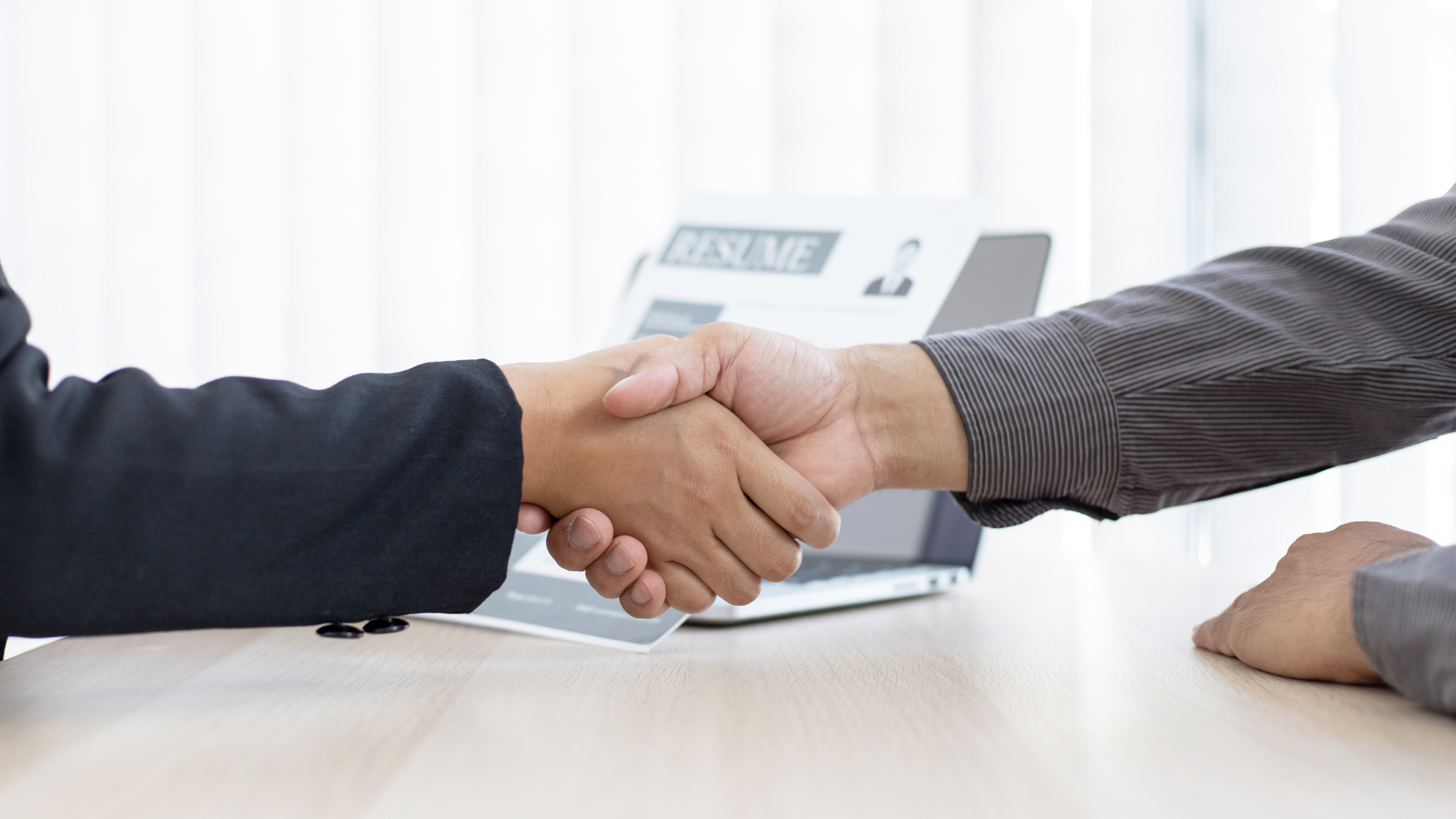 two people shaking hands